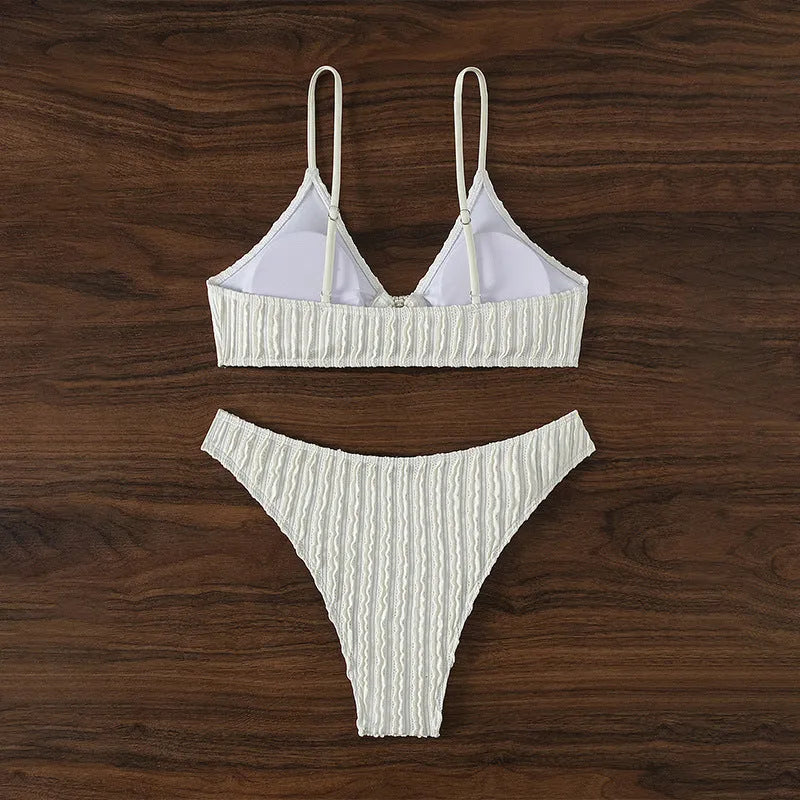 White women's V-neck beach split swimsuit with sleeveless design for swimming