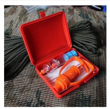Orange portable venom extractor suction pump first aid kit with storage box open, showing pump, cups, and swabs.