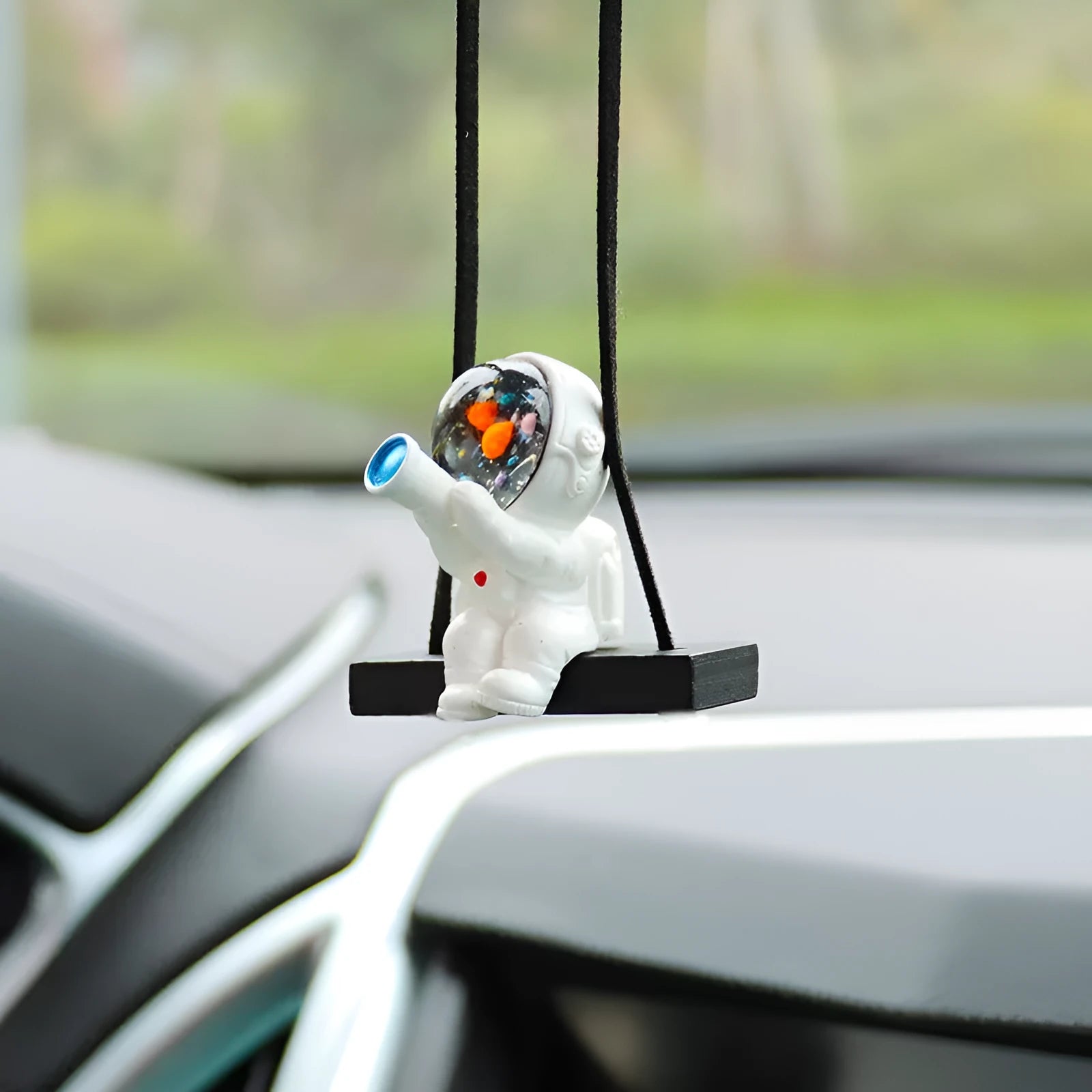 Resin cartoon astronaut car pendant decoration showing various astronaut character designs