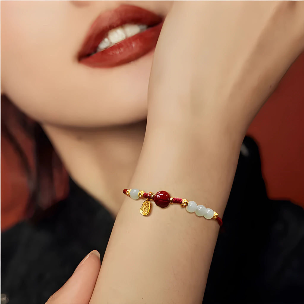 Women's adjustable bracelet with Hetian jade, cinnabar red rope and 925 silver components