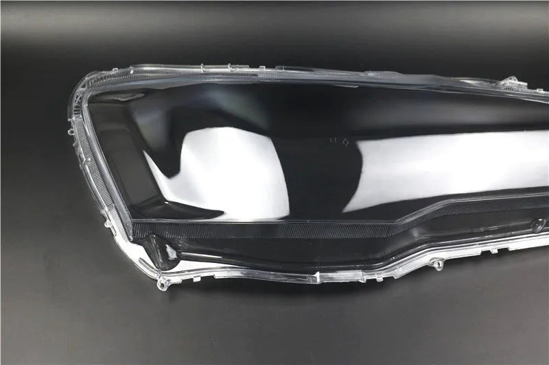 Transparent plastic headlight housing cover measuring 50x30x20mm for vehicle lamp replacement