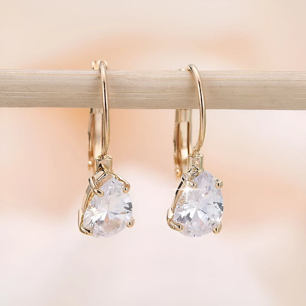 Women's drop-shaped copper earrings with metal inlays in gold and platinum colour options