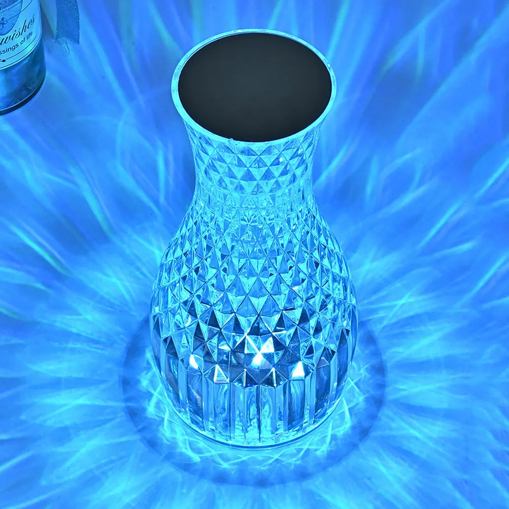 Crystal vase table lamp with remote control measuring 19cm tall on wooden bedside table