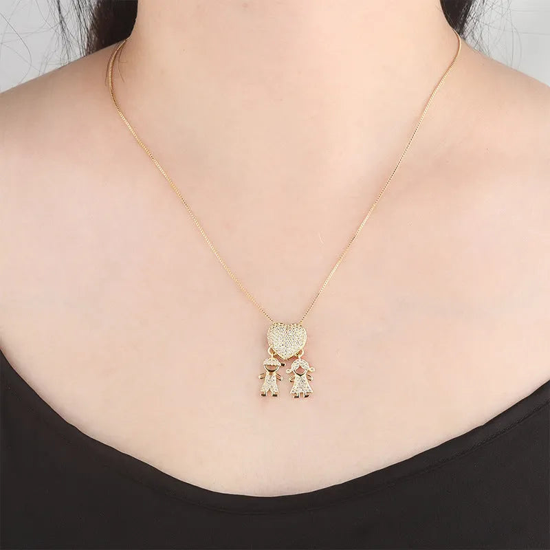 Gold colour copper family heart necklace with cubic zirconia inlay and boy girl motif pendant