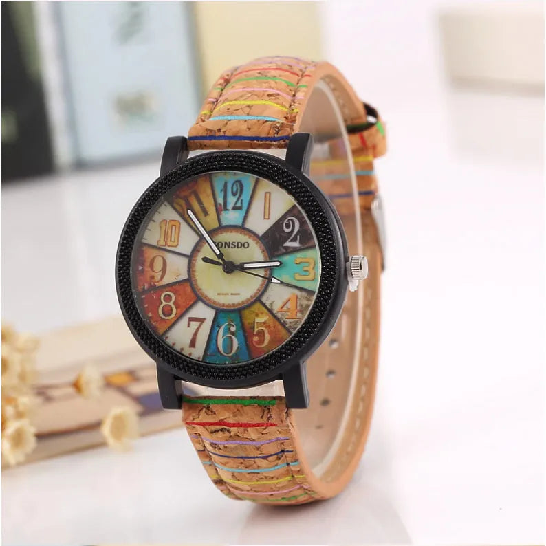 Women's leather strap quartz watch with 37mm round dial and stainless steel buckle
