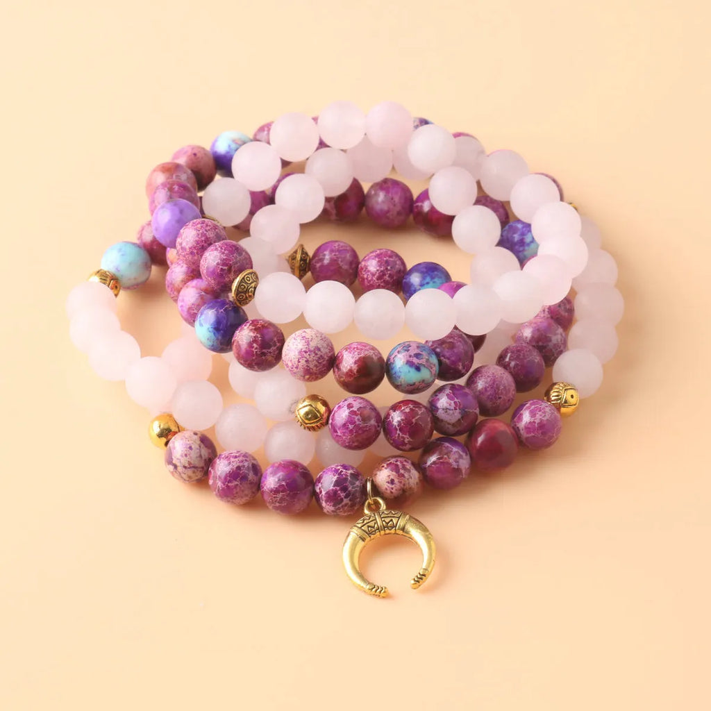Pink Emperor Stone crystal necklace with round bead pendant on model