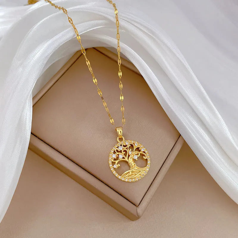Gold-plated necklace with mother-of-pearl pendant inlaid with rhinestones and zircon on an adjustable chain