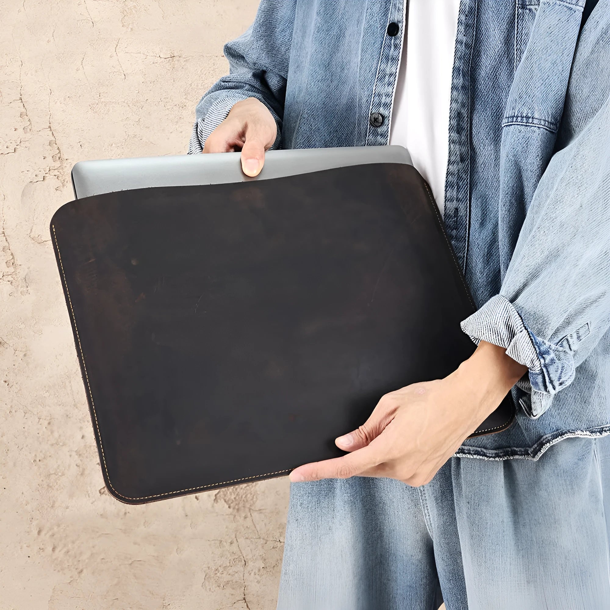 Brown genuine crazy horse leather computer bag with lined interior shown in medium and large sizes
