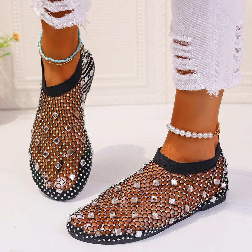Women's flat sandals with mesh upper and colourful rhinestone design, round toe shape with rubber sole