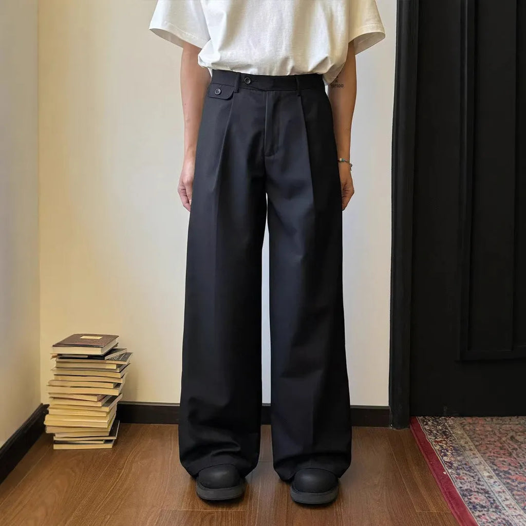 Men's brown straight-leg wide drape casual trousers laid flat