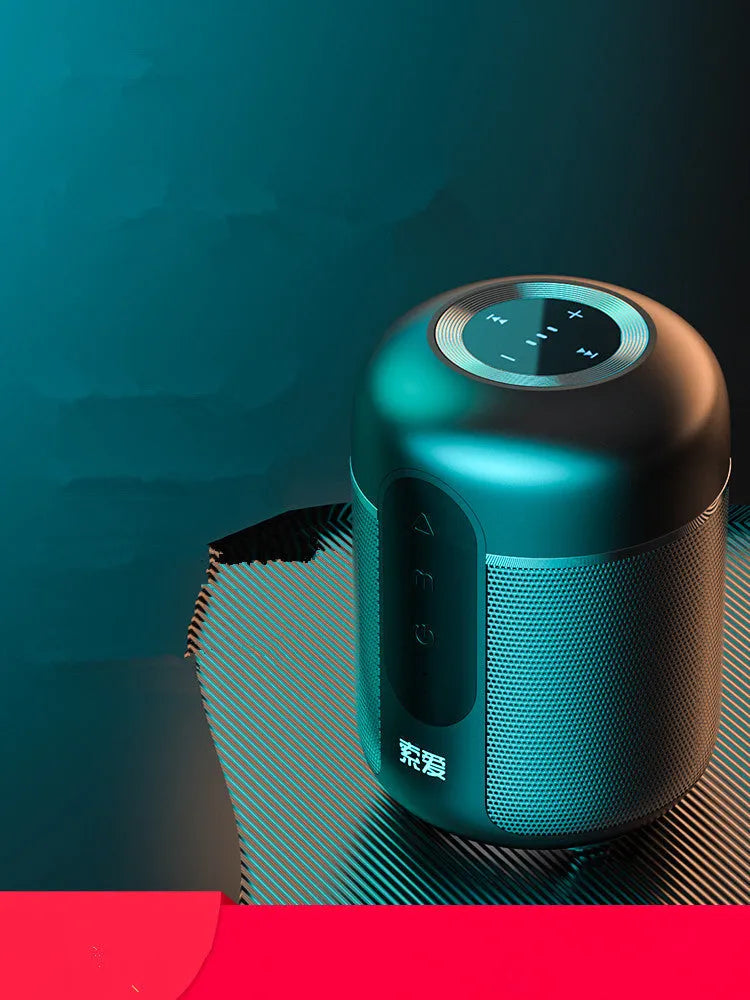 Black portable Bluetooth speaker with 30W output, showing front grille and compact size