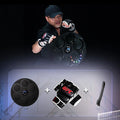 Black smart Bluetooth boxing target with coloured lights mounted on wall for fitness training