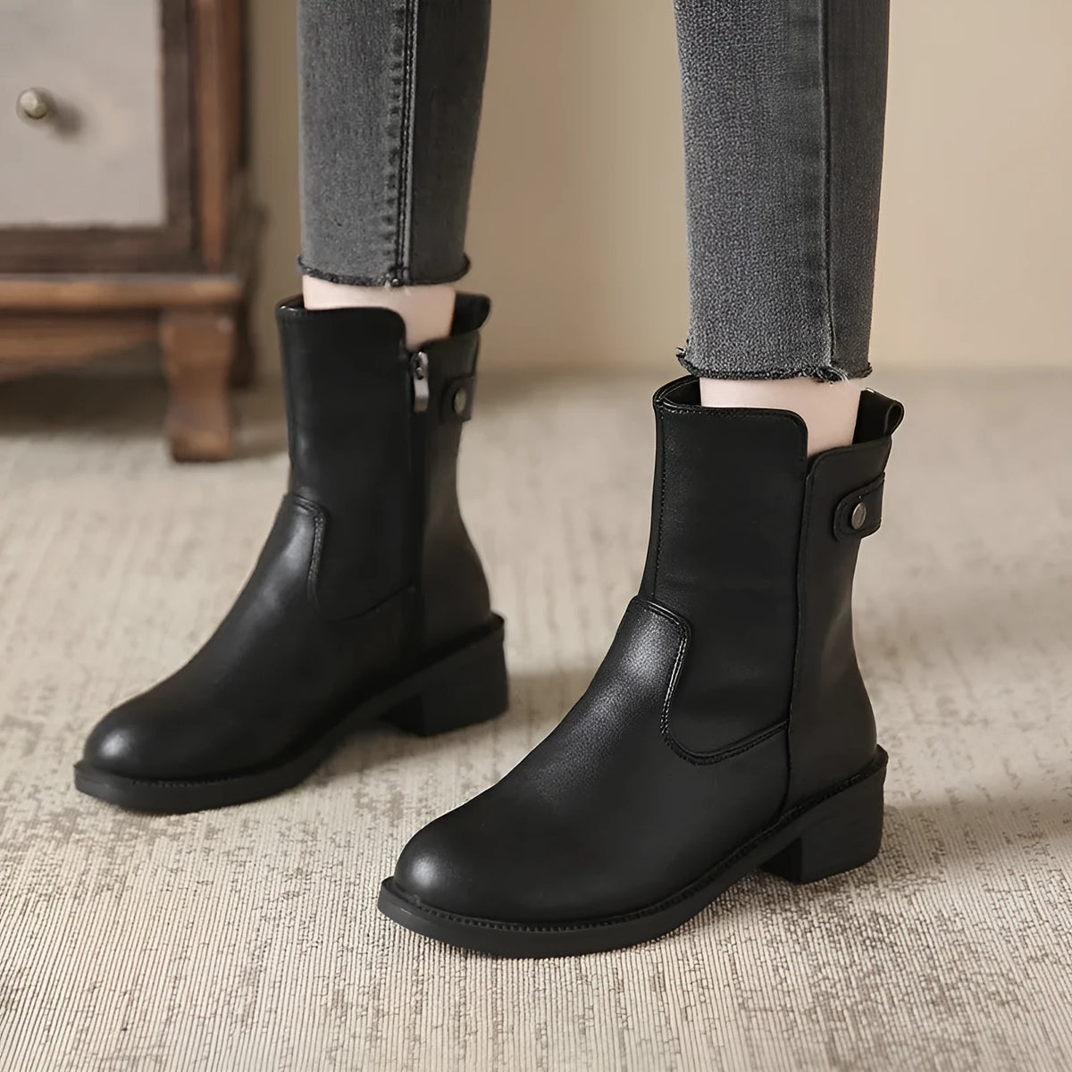 Black women's low heel short boots with round toe and side zipper made of artificial PU