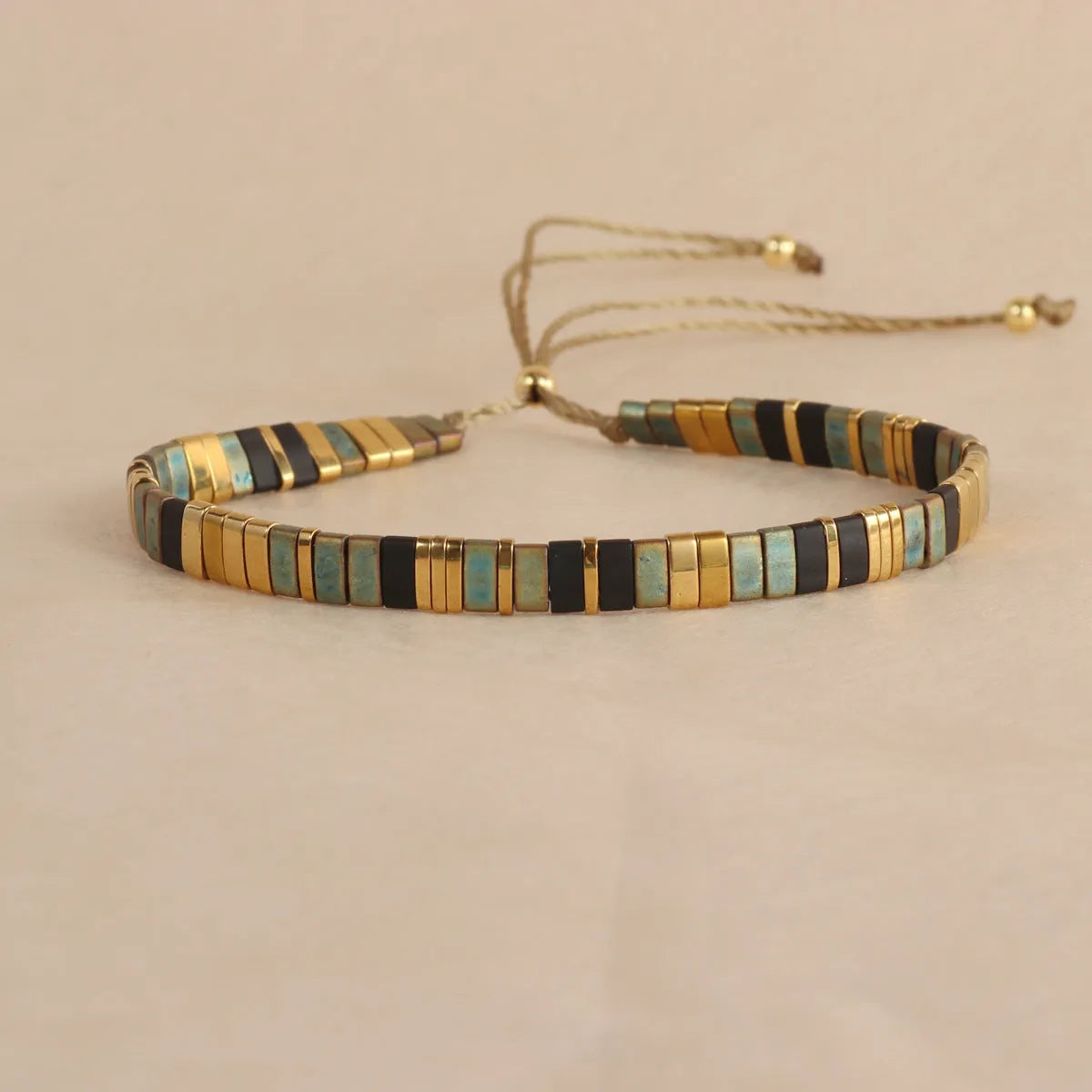 European American style pull bead bracelet with geometric designs in five colour options