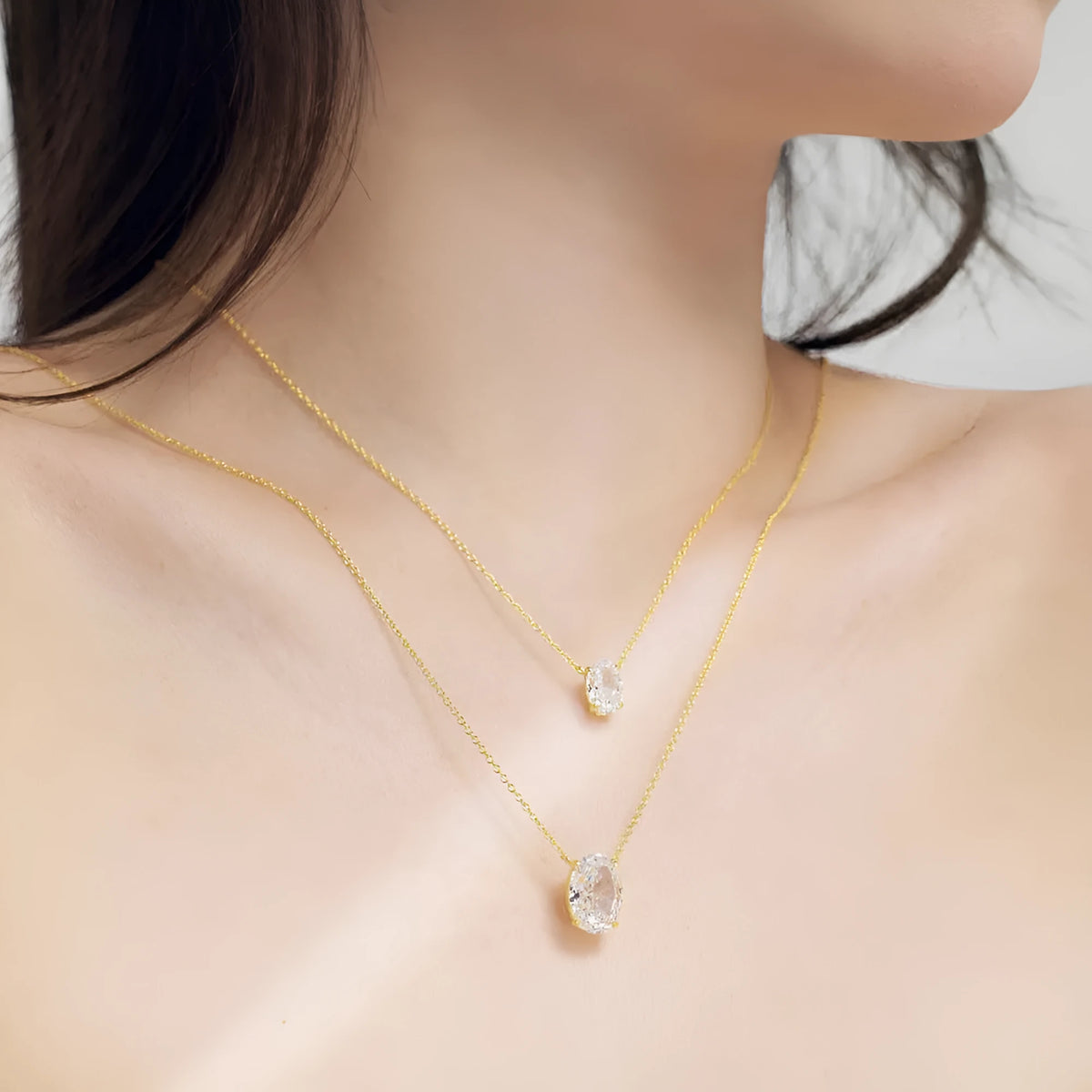 Sterling silver necklace with oval ice flower geometric pendant in gold or platinum finish