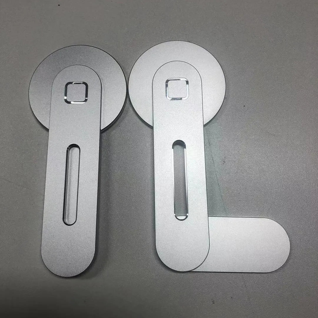 Aluminium magnetic desktop laptop stand in silver colour with silicone pads and arc-shaped magnetic strip.