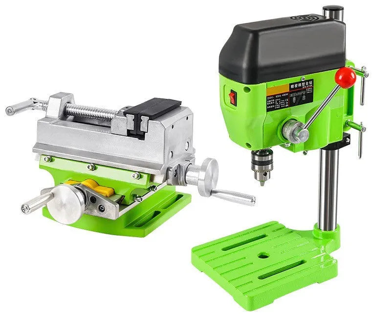 Bench drilling and milling machine with cross bench pliers and heavy duty bench pliers on a workshop table