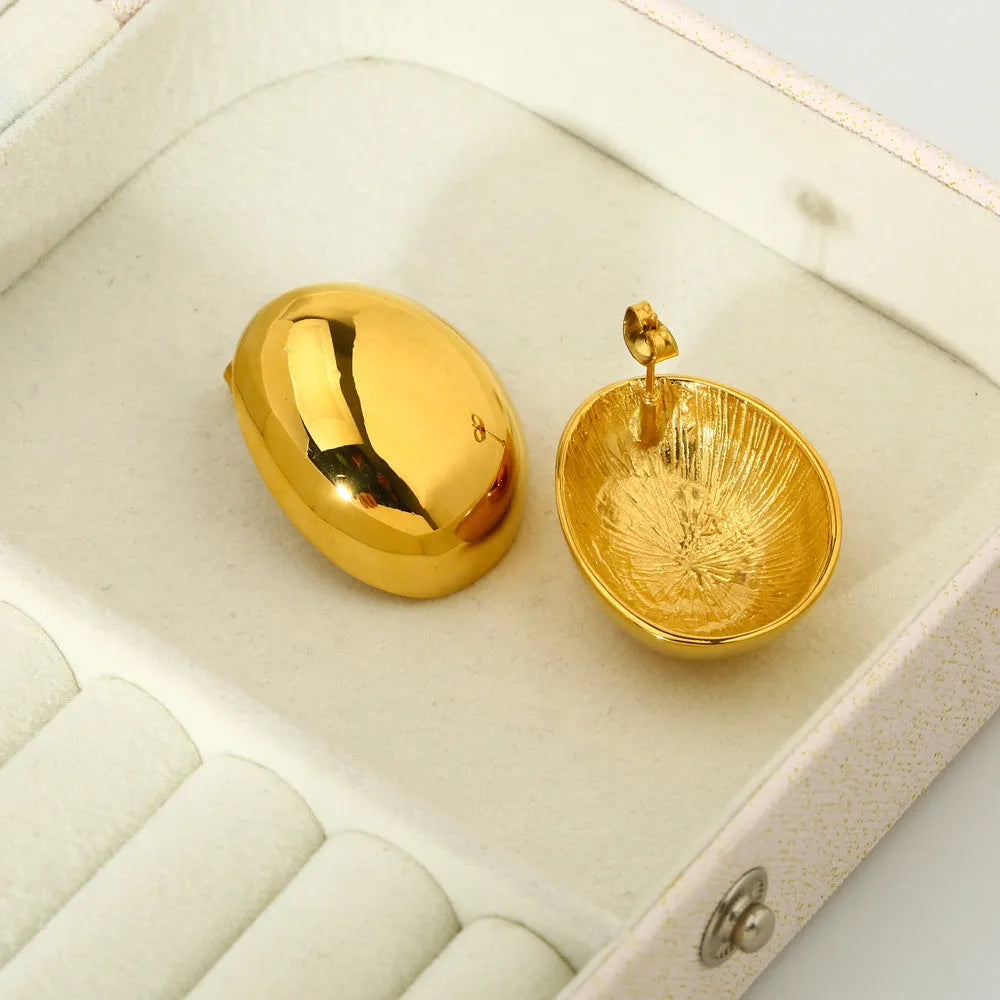 Geometric earrings with exaggerated glazed surface and 18K gold colour electroplated finish