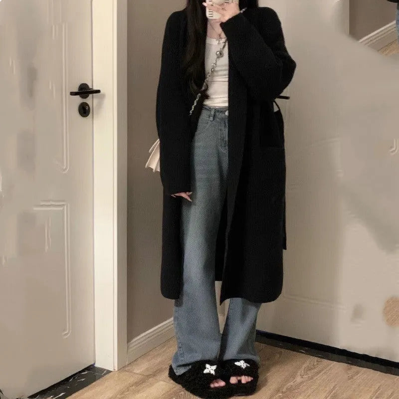 Women's loose large knitted cardigan in thick chenille fabric, shown in dark grey.