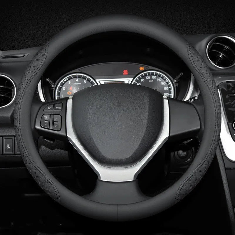 Black universal car steering wheel cover with stitch detailing, shown fitted on a 38cm wheel.