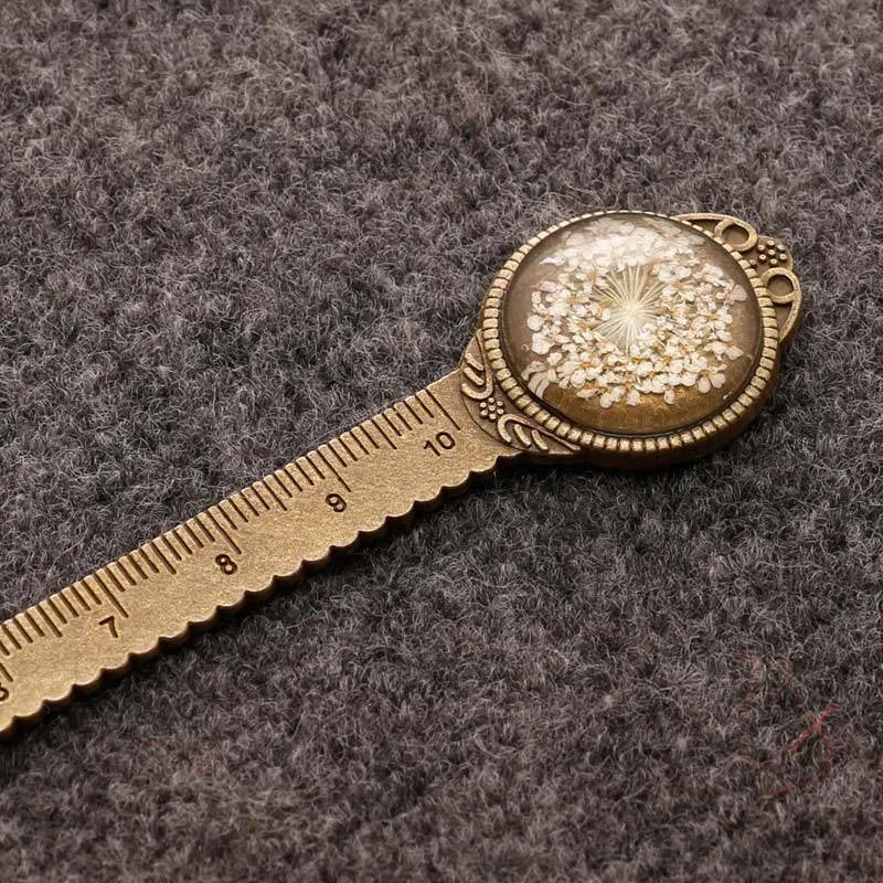 Handmade dried flower ruler bookmark with gypsophila, daffodil, lace flower, and clover on 12cm base in multiple colours.