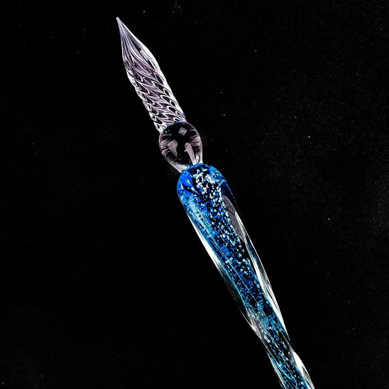 Glass dip pen with glass nib in a choice of colours, shown for calligraphy and drawing use
