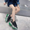 Women's high-top leather sports shoes with a thick clear jelly sole and cross-tie laces.