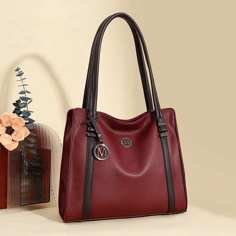 Women's soft genuine leather retro crossbody handbag in multiple colours with double strap.