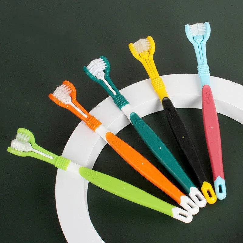 Three-head plastic pet toothbrush for dogs in grass green colour for oral cleaning