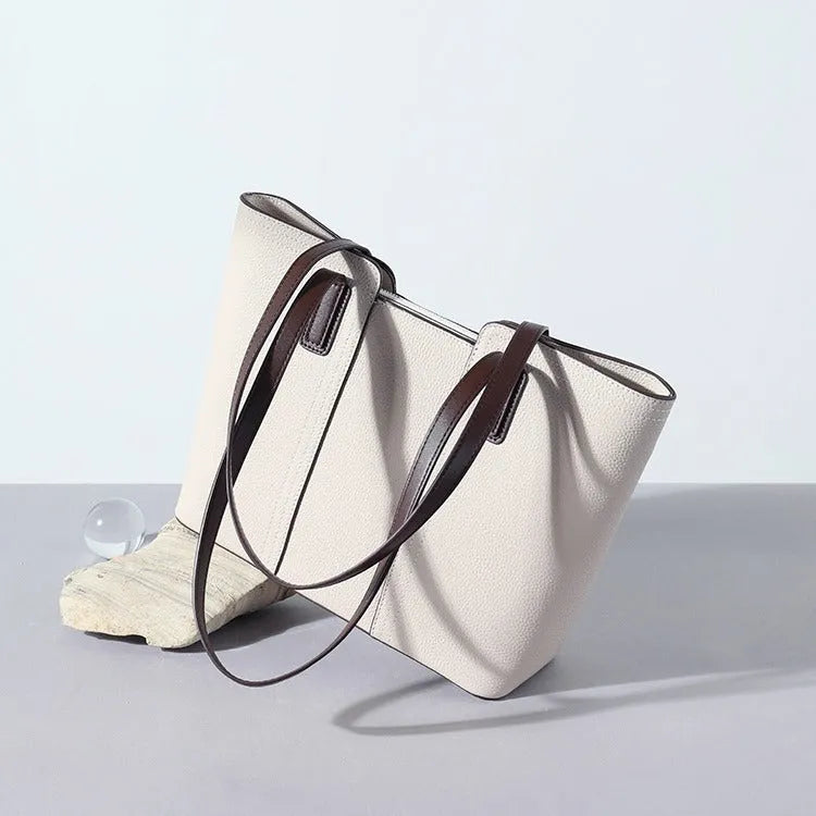 Genuine leather women's commuter shoulder bag in box-type design with large capacity and internal phone pocket