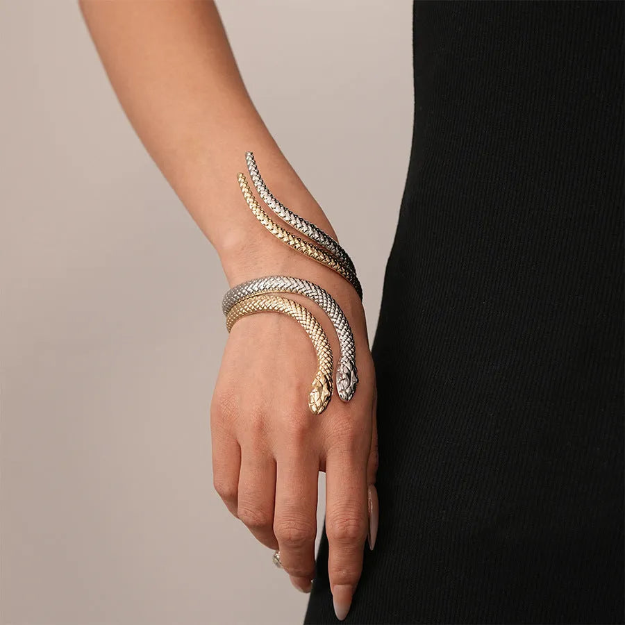 Gold tone simulated snake jewellery set with twisted winding ring and bracelet