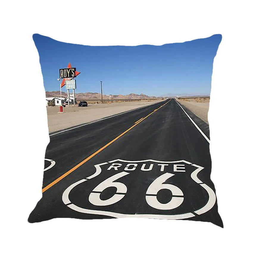 Square linen blend cushion cover with a Route 66 road landscape print, shown in a selection of colours.