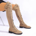 Black lace-up over-the-knee boots with a round toe, flat rubber sole, and stitching detail on the artificial PU upper.