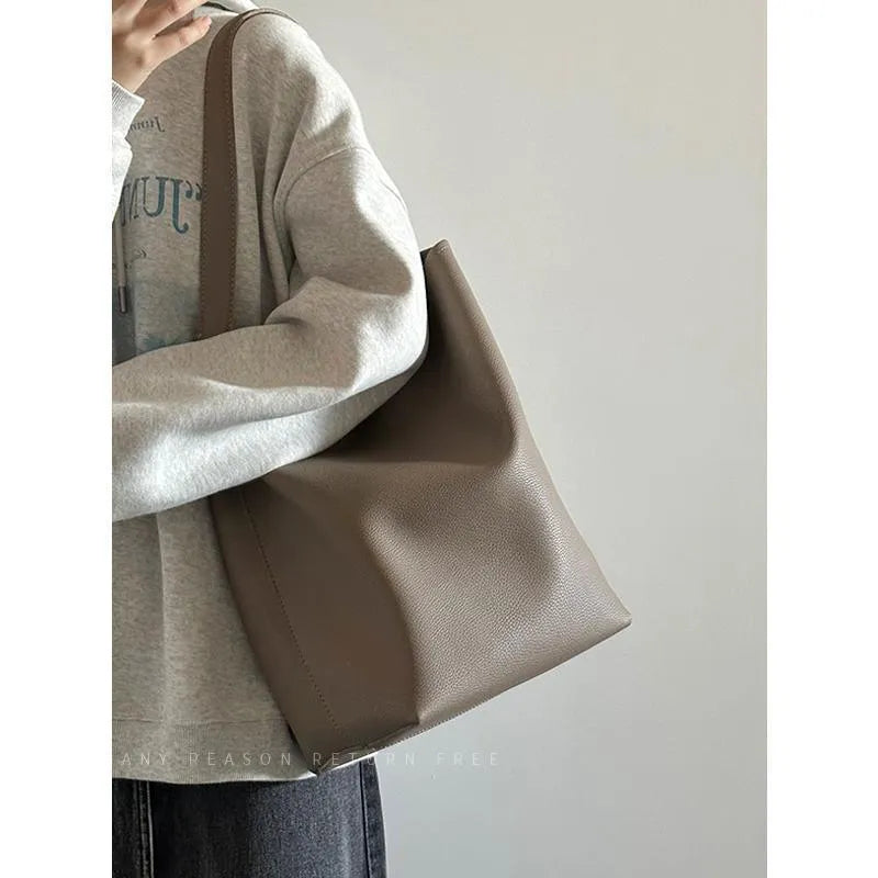 Large capacity PU bucket shoulder tote bag in grey or black, 25cm wide, 35cm high, 15cm thick, with file bag interior and sewing thread detail