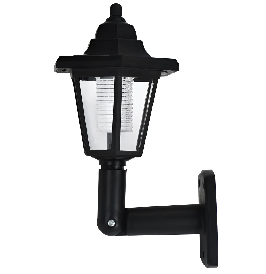 Black hexagonal solar-powered outdoor wall light with visible solar panel.