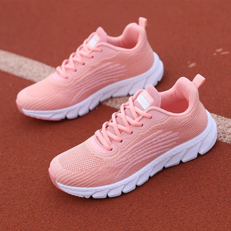 Unisex flyknit running shoes with mesh lining and EVA sole in white, black or pink, sizes 35-44