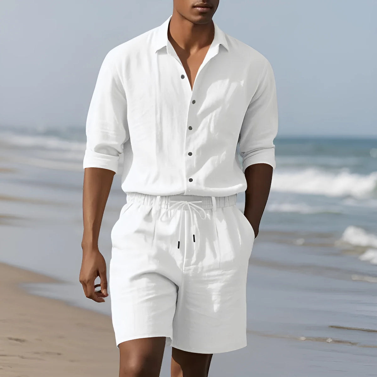 Men's linen long-sleeve shirt and shorts beach suit set on a hanger.