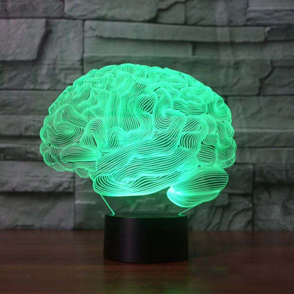 LED 3D acrylic illusion desk lamp with colourful remote control on a wooden table