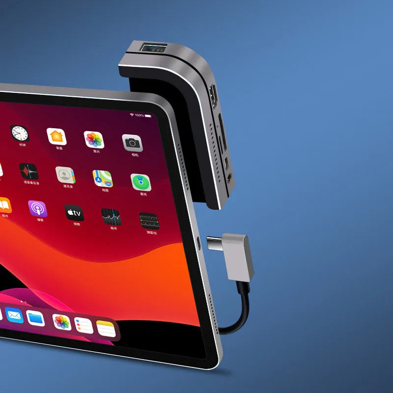 Silver aluminium Type-C docking station for iPad Pro with multiple ports including HDMI and USB