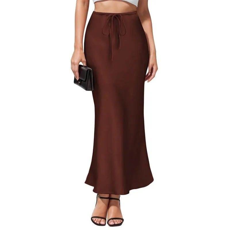 Asymmetric high-waisted acetate satin skirt in a solid colour with irregular stitching detail