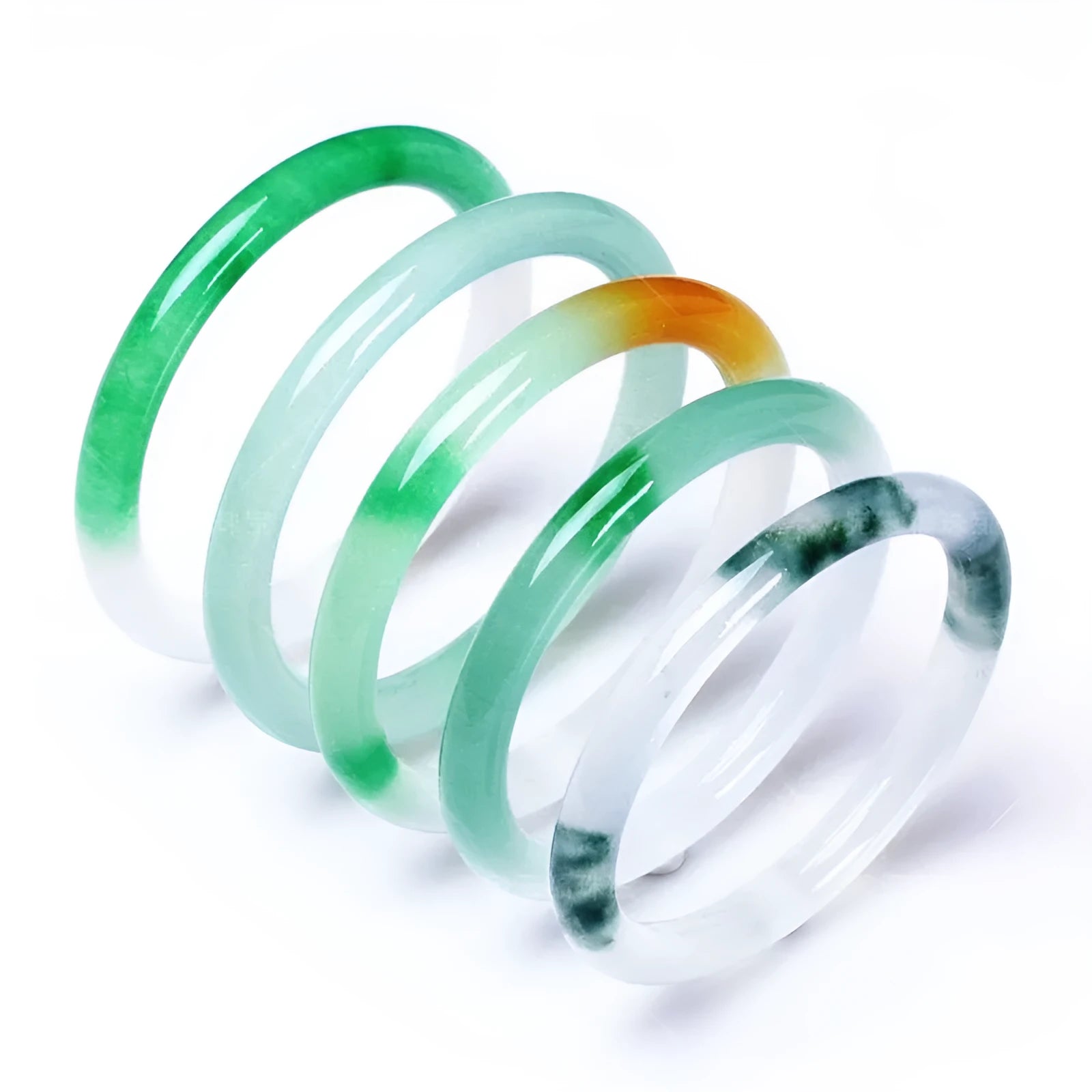 Jade bracelet with floating flower design in ice-like emerald tones and auspicious patterns