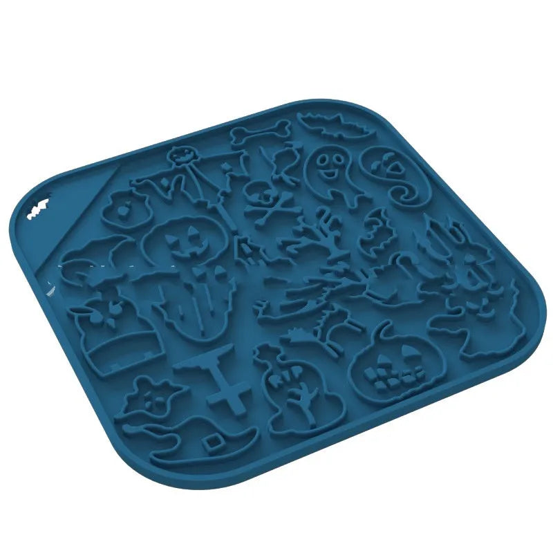 Edible silicon anti-choke slow feeding dog bowl in Halloween orange colour on floor