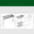Stainless steel portable folding barbecue grill oven set up outdoors.