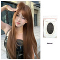 Warm brown long straight synthetic wig with fringe bangs on a model.