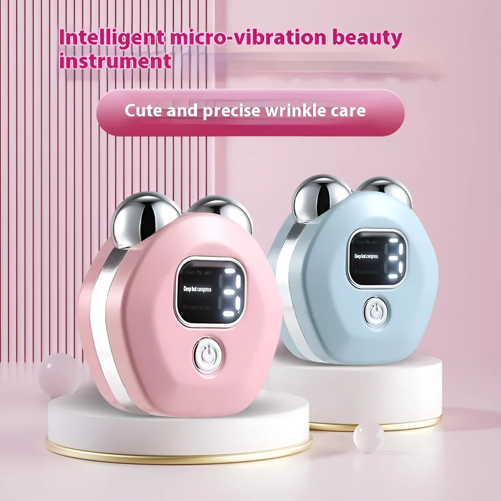 Portable white hot compress and micro current facial massage instrument with double rollers on a table.