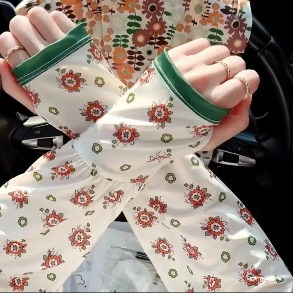Ice silk oversleeve gloves with floral printed designs for UV protection and elbow coverage