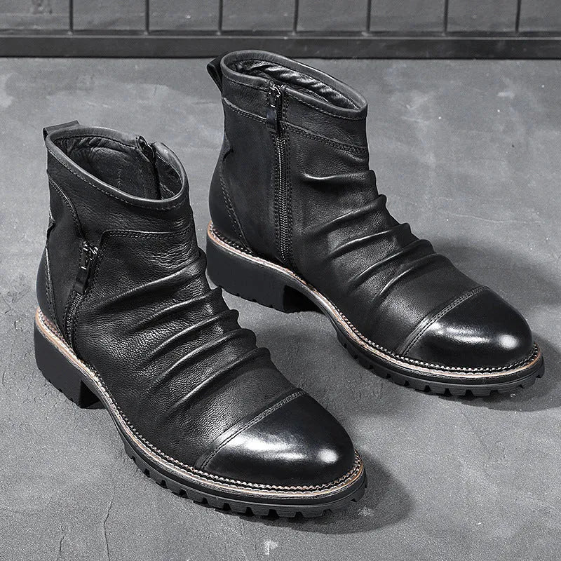 Black mid-height cowboy boots with side zipper, round toe, and a low horseshoe heel on a white background.