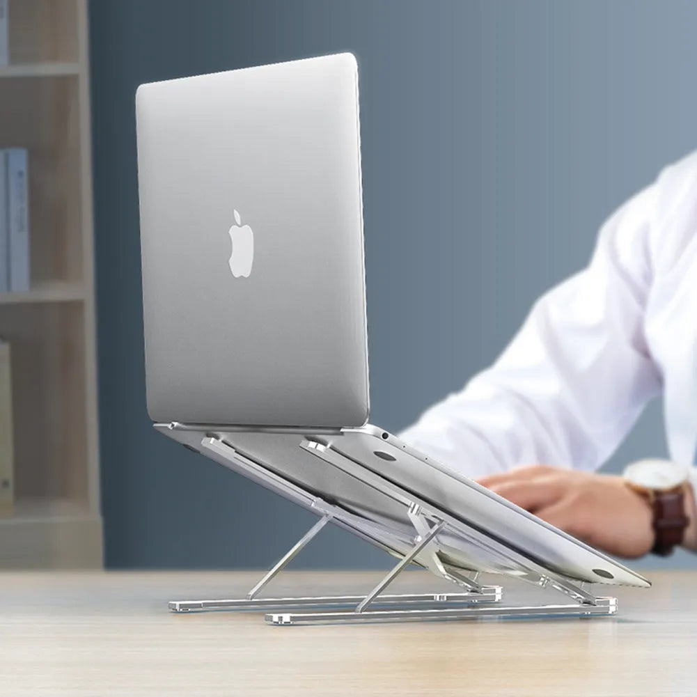 Foldable aluminium laptop stand in silver colour, shown extended and collapsed.