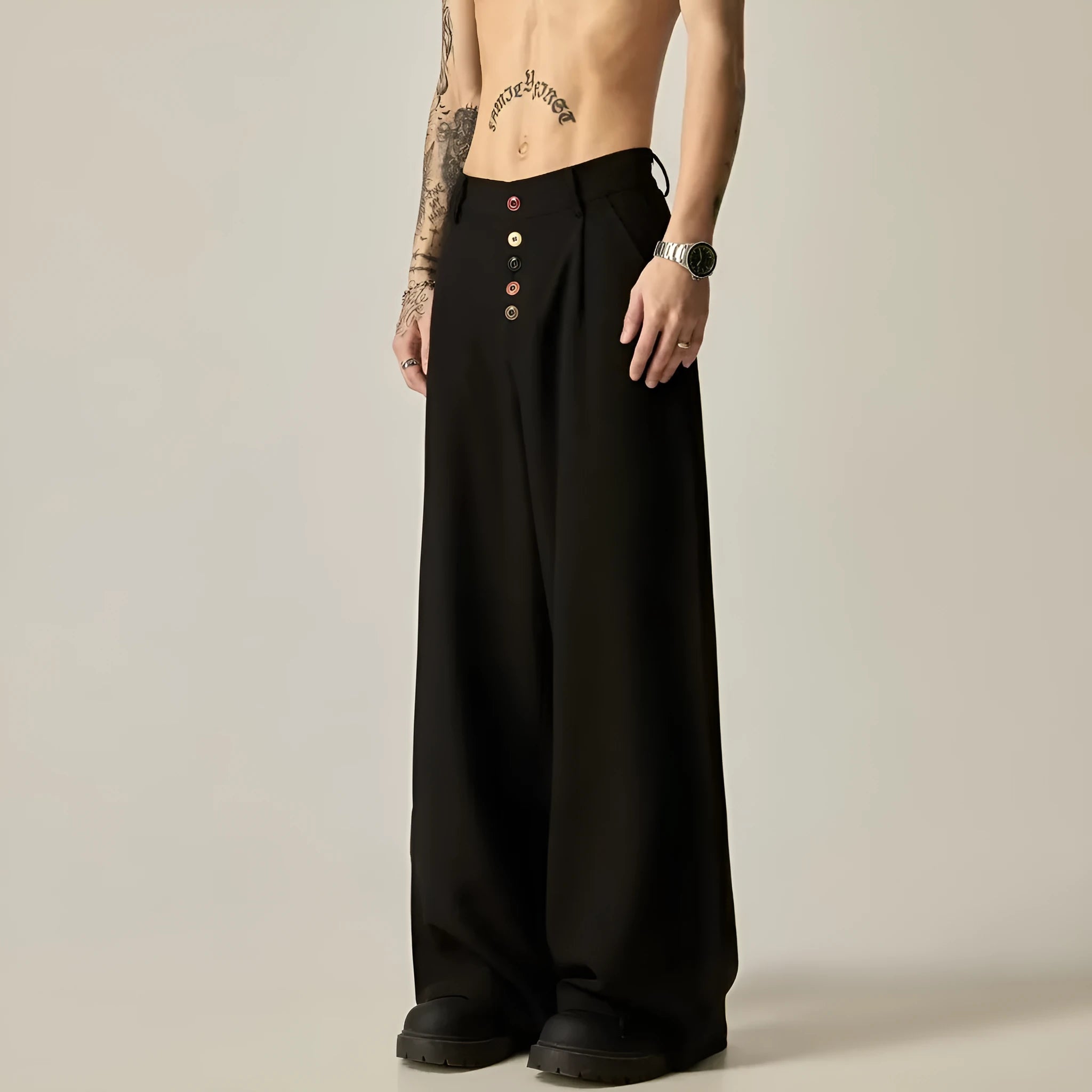 Men's black vertical tube wide-leg trousers showing cotton blend fabric texture and straight-leg silhouette