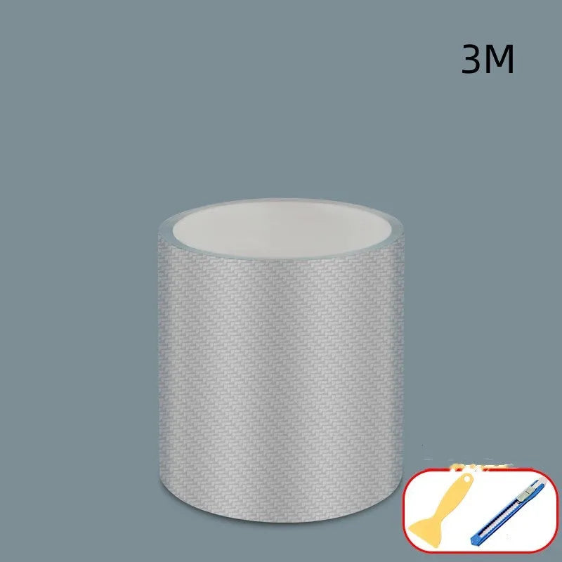 Roll of transparent carbon fibre texture anti-collision strip for car door protection.
